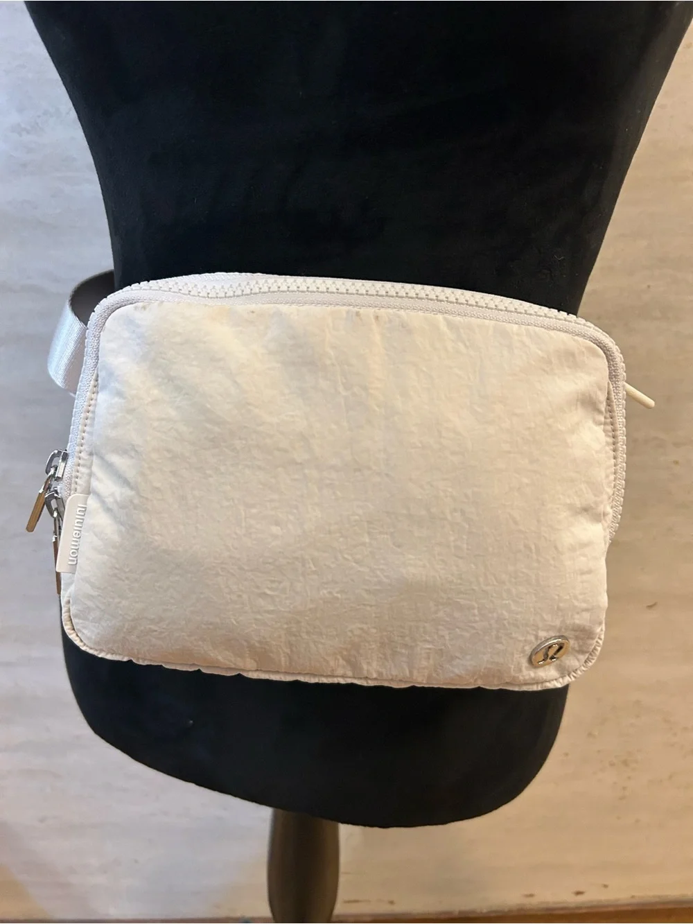 lululemon Everywhere Belt Bag in an off-white colorway, White Opal.